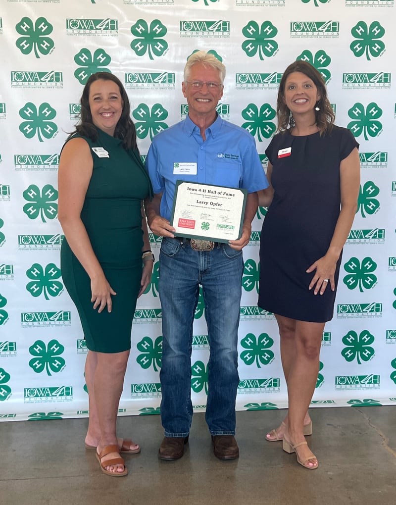 Jasper County’s Larry Opfer with his 4-H Hall of Fame induction certificate during the ceremony Aug. 18 at the Iowa State Fair.