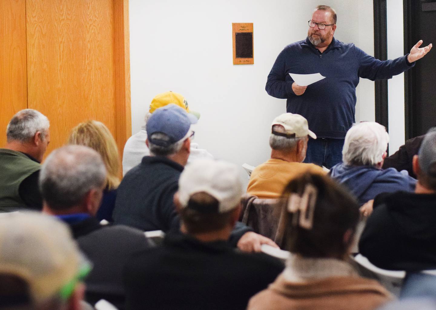 Jasper County Treasurer Doug Bishop, who is running unopposed for mayor of Baxter, speaks with residents during a town hall meeting on Nov. 1 at the Baxter City Hall Community Building.