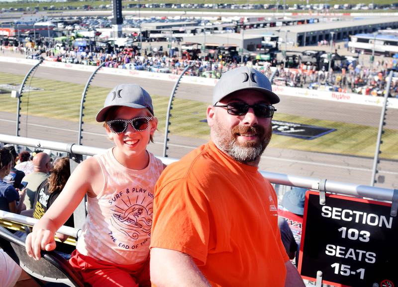 From left: Klay Richards and Charles Richards, of La Crosse, Wisc., pose for a photo at the NASCAR Cup Series Iowa Corn 350 race on June 16 at the Iowa Speedway in Newton.