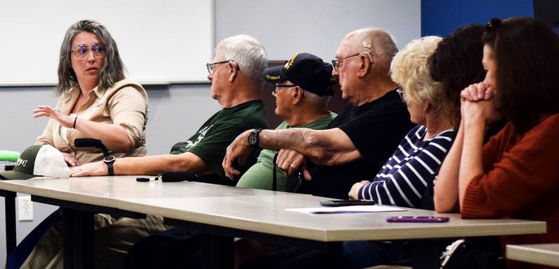 Alyssa Wilson, administrator of Jasper County Veterans Affairs, speaks to visitors of the Jasper County Veterans Affairs Commission meeting on May 8 inside the conference room of the county administration building.