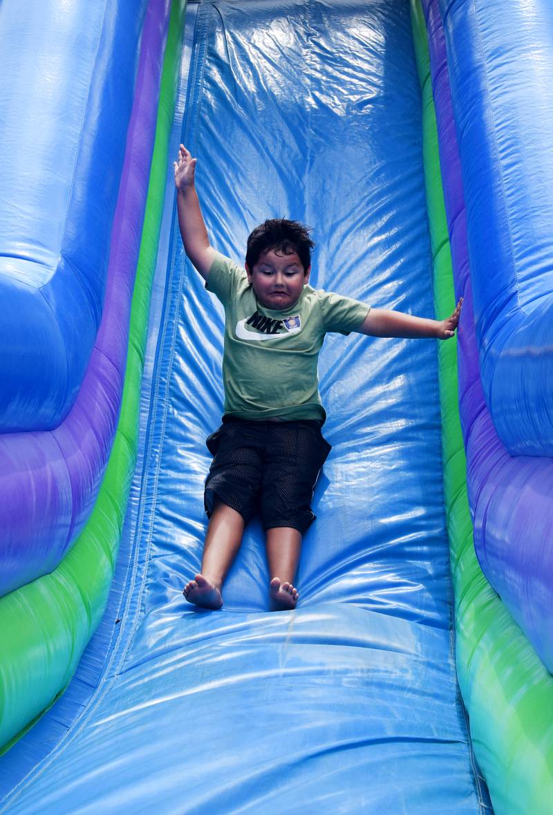 The kids zone at Newton Fest featured a number of inflatables, a climbing wall, mini-golf and laser tag on June 8 at Maytag Park.