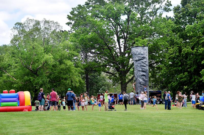 The kids zone at Newton Fest featured a number of inflatables, a climbing wall, mini-golf and laser tag on June 8 at Maytag Park.