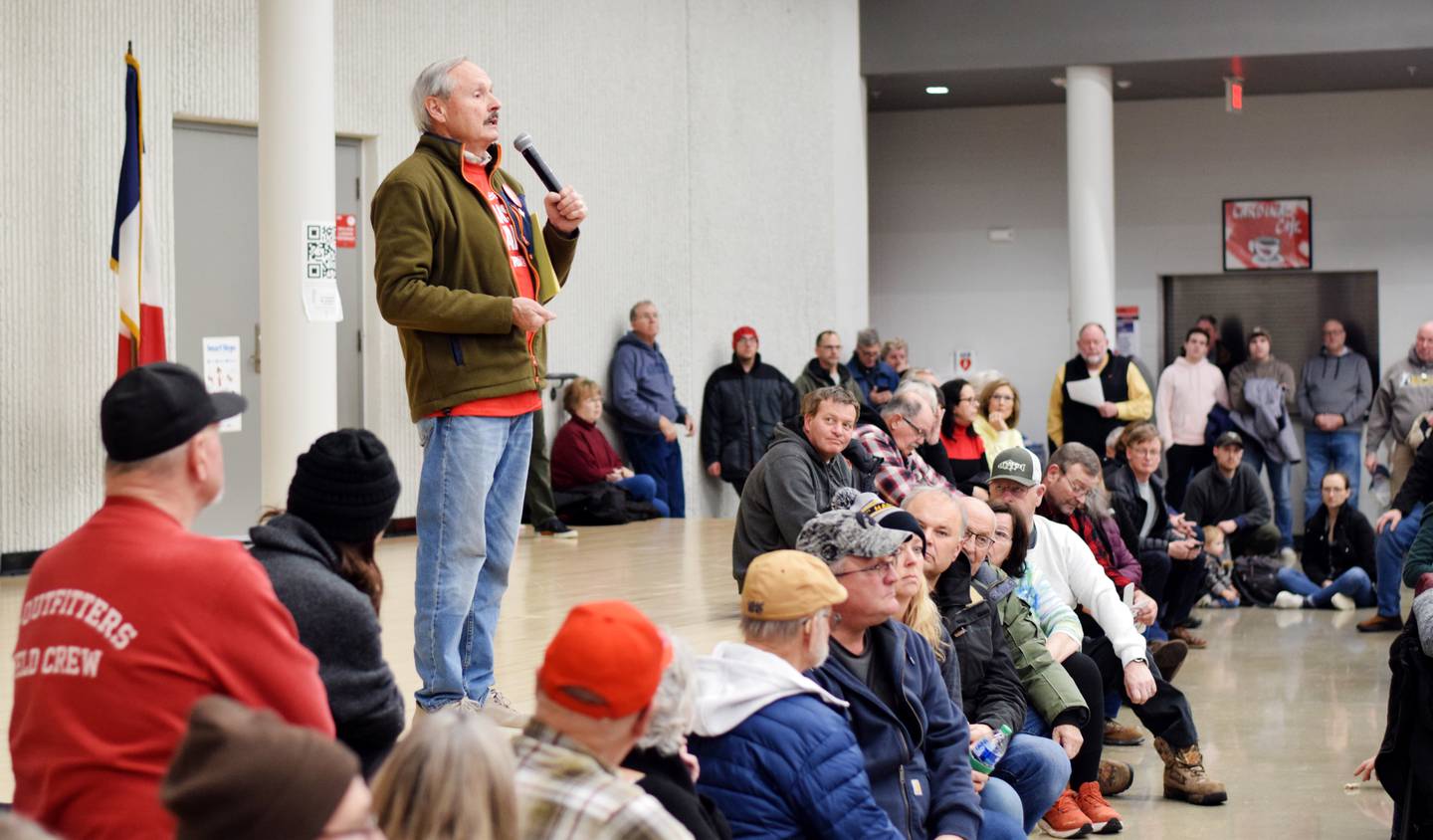 Newton residents gather during caucus night Jan. 15 at Berg Middle School. Despite frigid temperatures and overwhelming snowfall, residents showed up in droves to participate in the caucuses, which were overwhelmingly in support of former president Donald Trump in Jasper County and throughout the state.