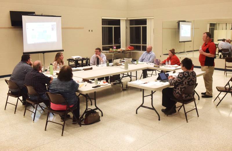 The Newton Community School District Board of Education discuss their master planning options during a work session April 10 at the high school.
