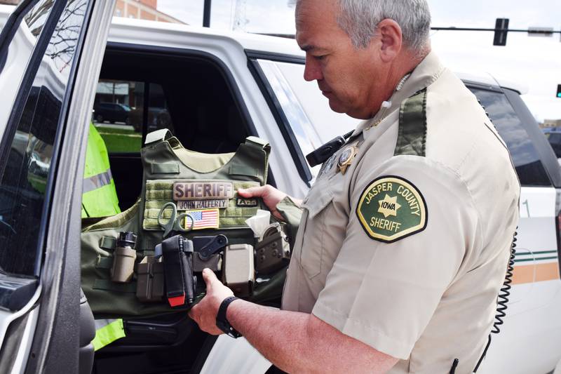 Jasper County Sheriff John Halferty shows where the current body cameras are placed. The Jasper County Board of Supervisors on April 19 approved the replacement of body cameras and car cameras for sheriff's office staff over a five-year period.