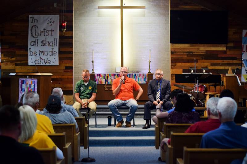 Three Republican candidates running for Jasper County sheriff – from left: Lt. Brad Shutts and Sgt. Tracy Cross of the Jasper County Sheriff's Office and Colfax Police Chief Jeremy Burdess – take turns speaking during a party-organized forum May 14 at St. Luke United Methodist Church in Newton.