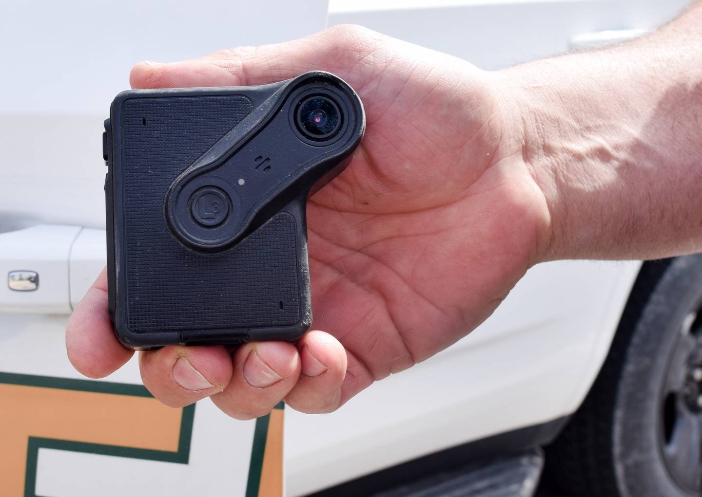 Jasper County Sheriff John Halferty shows off the current body cameras used by himself and his law enforcement staff. The Jasper County Board of Supervisors on April 19 approved the replacement of body cameras and car cameras for sheriff's office staff over a five-year period.