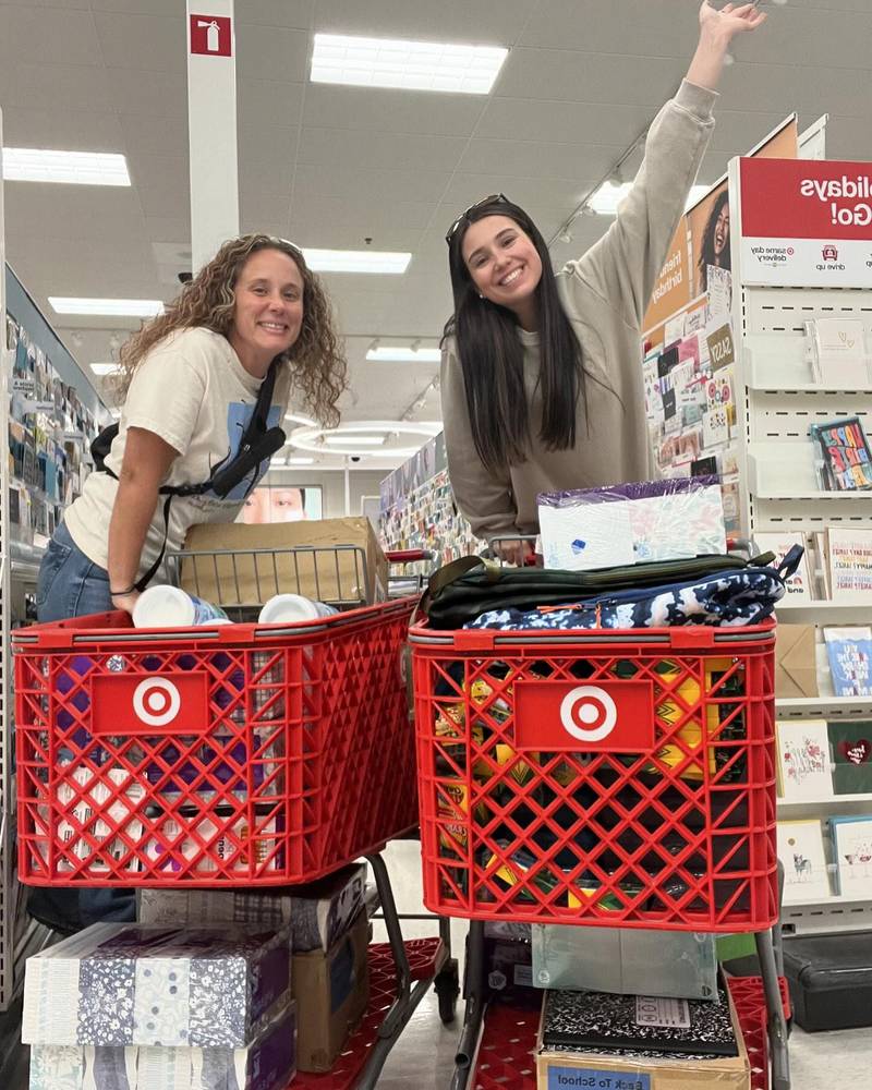 Darian Morrison, right, organized a fundraiser for the Newton Community School District that resulted in $890 used for school supplies for all six buildings in the district.