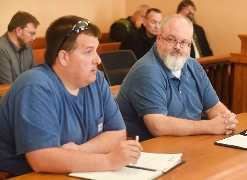 From left: AFSCME Local 2840 President Craig Keith and AFSCME Union Representative Adam Swihart speak to the Jasper County Board of Supervisors during its meeting on Feb. 27 at the Jasper County Courthouse.