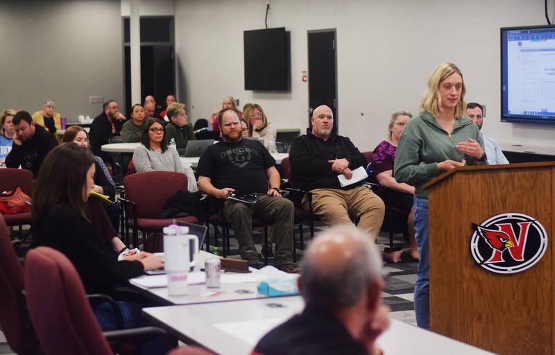 Emilee Brisel, a first-grade teacher at Woodrow Wilson Elementary, speaks to Newton school board members on March 25 at the E.J.H. Beard Administration Center.