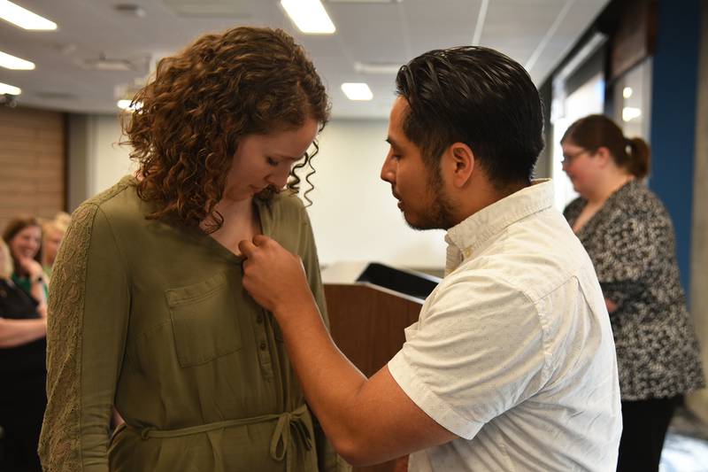 Tabatha Lopez of Valeria receives her nursing pin.