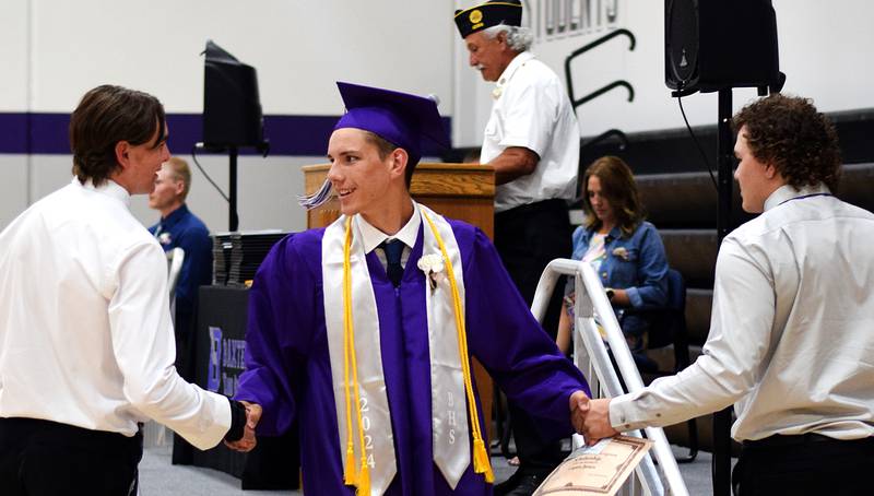 The Baxter Class of 2024 seniors take home diplomas and scholarships during commencement ceremony May 19 at the Baxter Community School District.