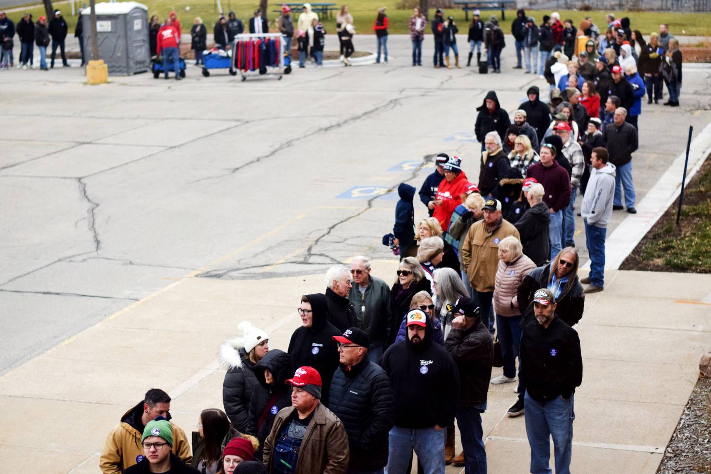 Supporters of Donald Trump wait in line for a Jan. 6 rally at DMACC Newton Campus.