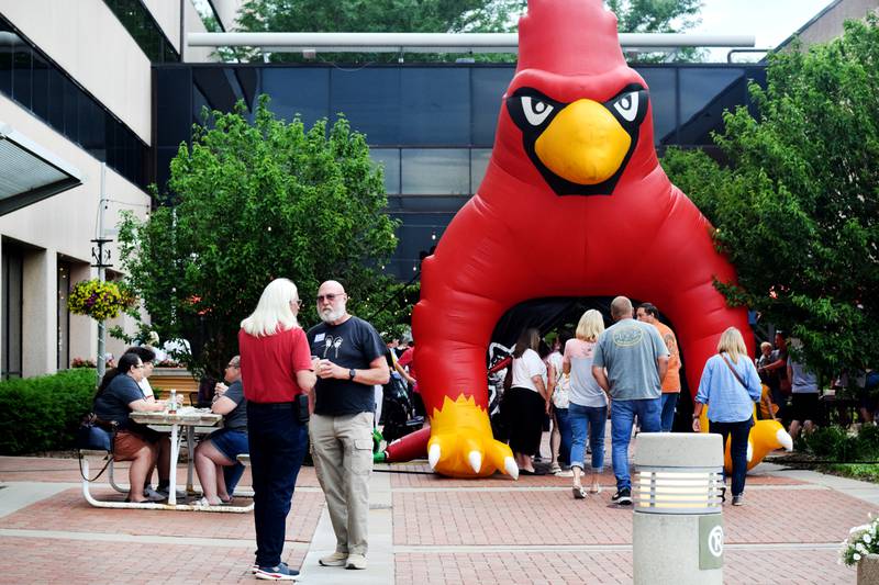 Newton High School graduates gather for drinks and camaraderie at the all-class reunion June 7 at Legacy Plaza. Newton Alumni Weekend brought back Cardinals for a weekend of partying and fellowship.