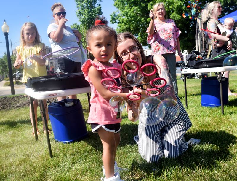 Lots of children participate in the Absolute Science Bubble Open House on June 20 at the Newton Public Library.