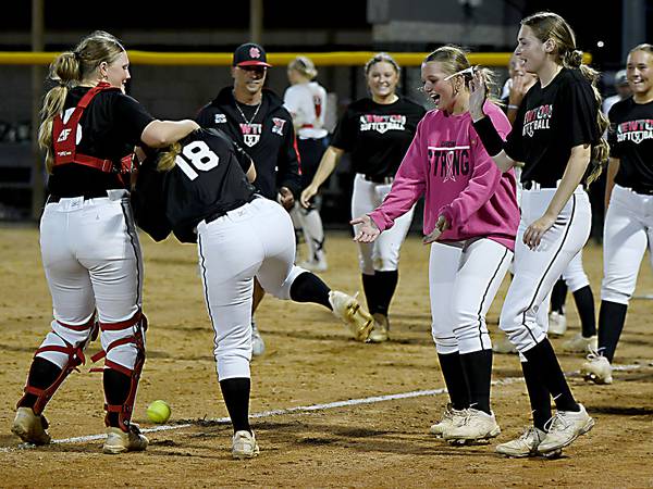 Newton softball outlasts Knoxville in extras