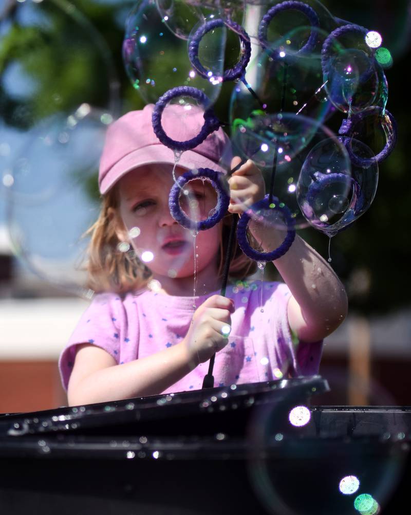 Lots of children participate in the Absolute Science Bubble Open House on June 20 at the Newton Public Library.