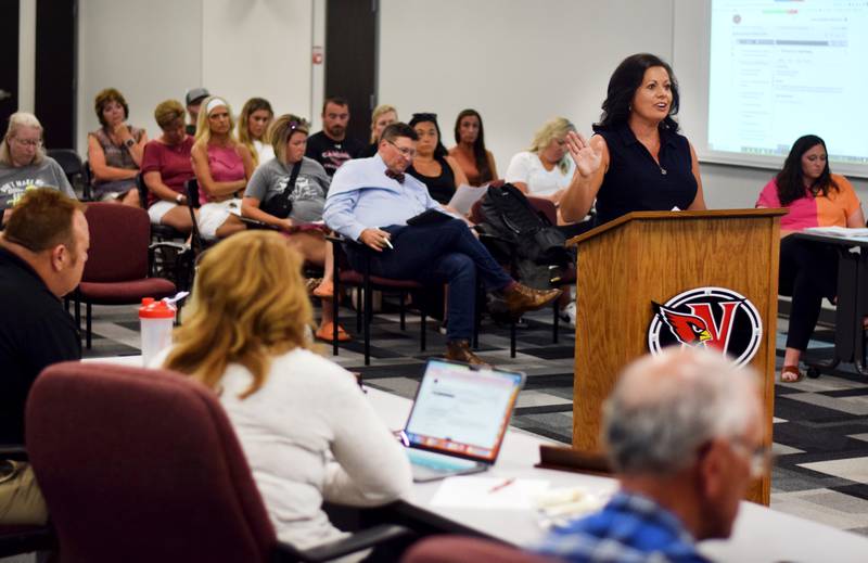 Jenny Mann speaks during an open forum about the Newton Community School District's master planning proposals at the July 10 school board meeting.