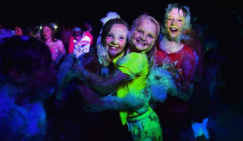 Kids enjoy the return of the Glow Foam Party – which featured two cannons this year – during Newton Fest on June 7 at Maytag Park.