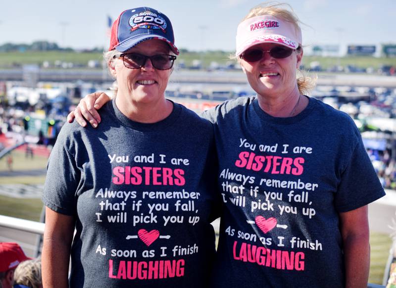 Sisters Lyn Koller and Jean Lunde, of Wisconsin, pose for a picture before the NASCAR Cup Series Iowa Corn 350 race on June 16 at the Iowa Speedway in Newton.